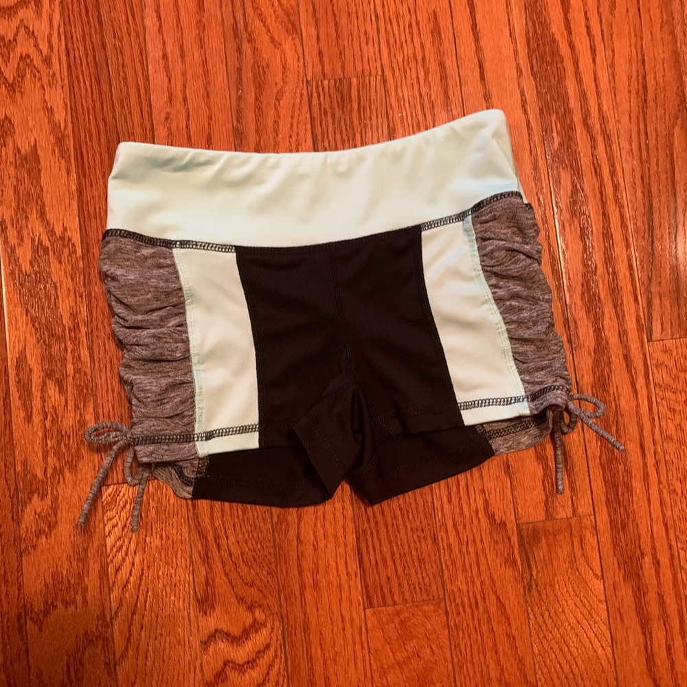 Blue and grey athletic shorts with ties